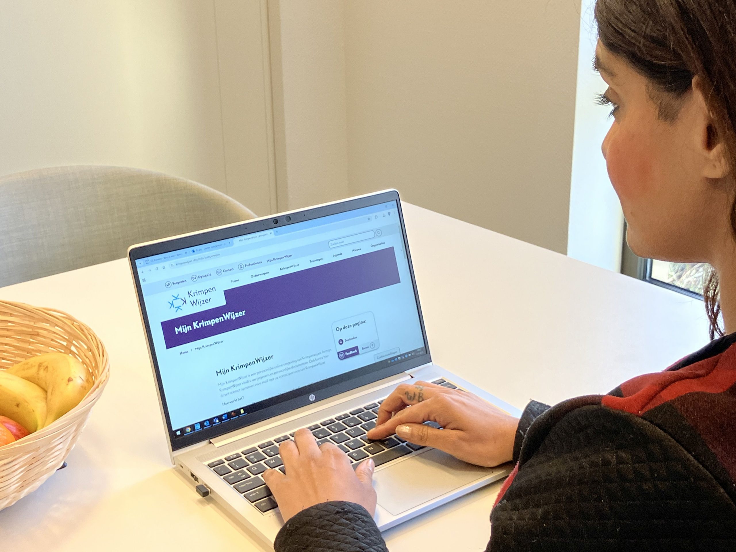 Laptop met website KrimpenWijzer in beeld